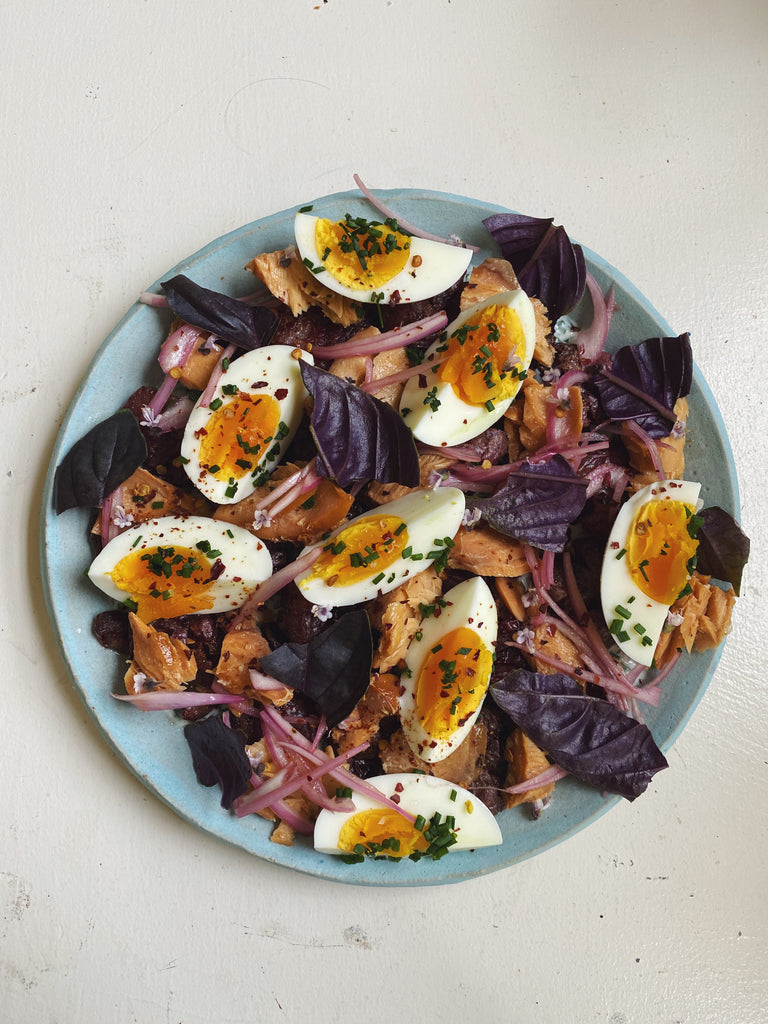 Crispy Potatoes with Smoked Coho salmon, Hard Boiled Eggs, Pickled Shallots and Herbed Yogurt