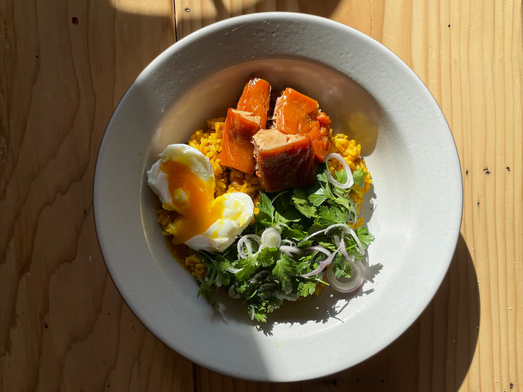 Kedgeree with Soft Egg, Smoked Salmon, Herbed Salad, and Golden Raisin